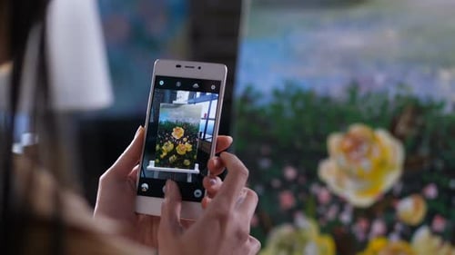 Hands of Artist Taking Smartphone Photo of Canvas
