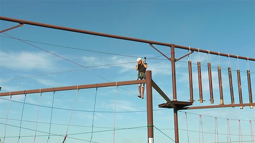 Man Walking on a Rope Road