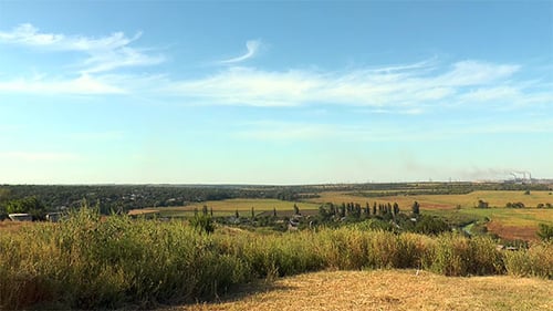Field Against the Sky With Clouds