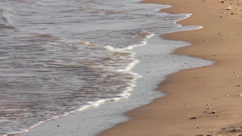 Sea Water Waves And Sand Beach