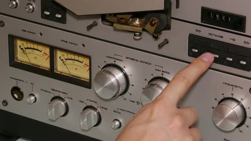 Operating A Vintage Reel To Reel Tape Recorder