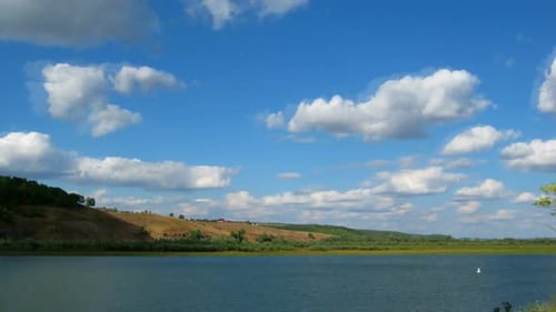 Clouds Moving Over River