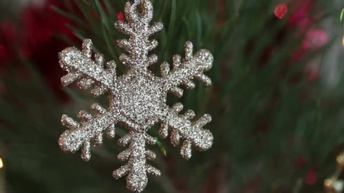 Glittery Christmas Snowflake Ornament On Christmas Tree