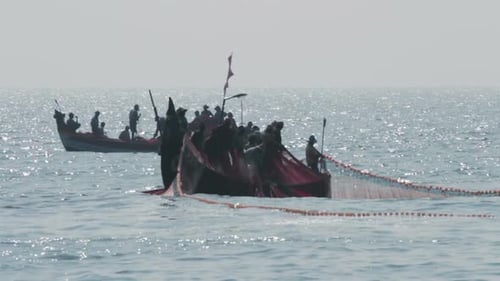 Fishermen In Boats Pulling Fishing Nets - Kerala India 3