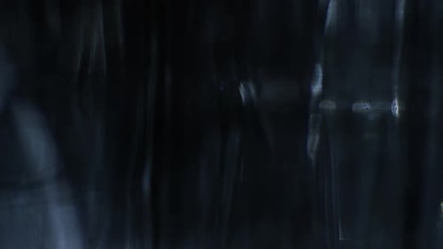 Abstract Background with Moving Light Effects