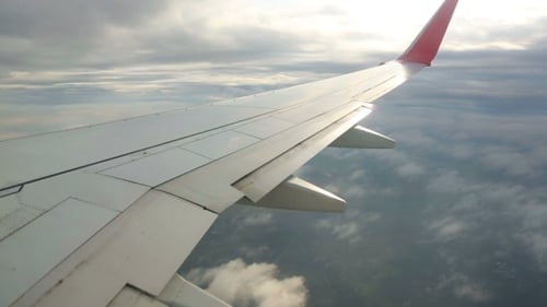 Flying Between Layers Of Clouds