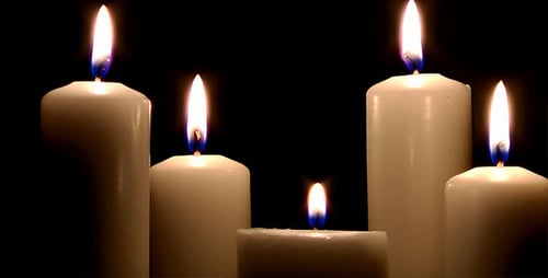 Candles Flickering in the Dark Creates a Warm Glow