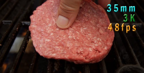 Cooking A Hamburger On Grill 02