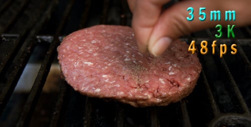 Seasoning Burgers On The Grill 03