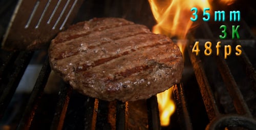 Burger Patty Cooking on the Grill