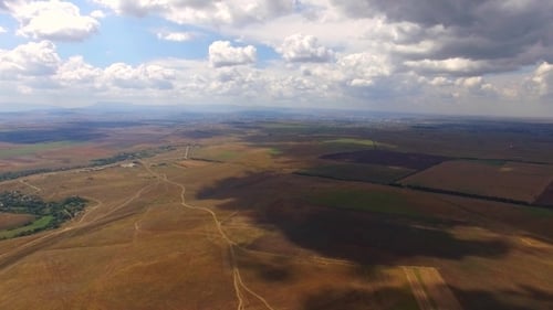 Aerial View of Rural Landscape with Green Fields