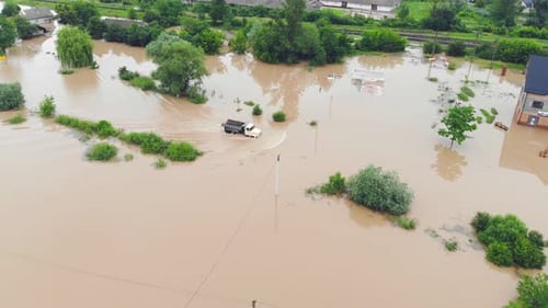 Aerial View River That Overflowed After Heavy Rains and Flooded Agricultural Fields