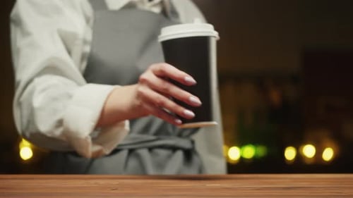 Buying Coffee or Tea and Paying By Cash Closeup