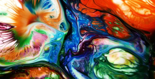 Colorful Ink Swirls and Mixes Abstractly