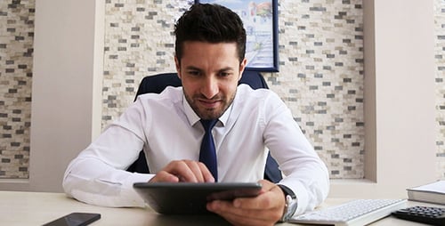 Businessman Using Tablet