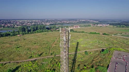 Aerial View of Cell Tower on Hillside