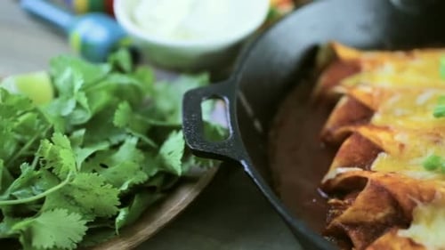 Delicious Cheesy Enchiladas in Rustic Skillet