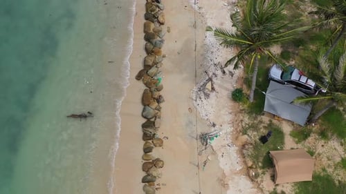 Tent and car on the sea shore