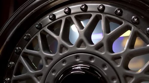 Close Up View of Threepiece Forged Silcer Color Wheels with Classic Pattern