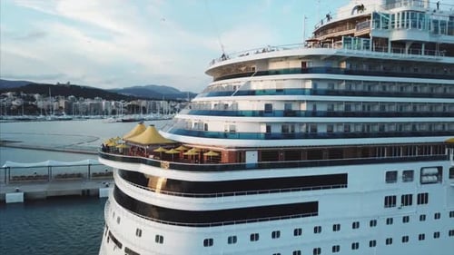 Aerial View Of The Cruise Ship In Harbor At Sunset