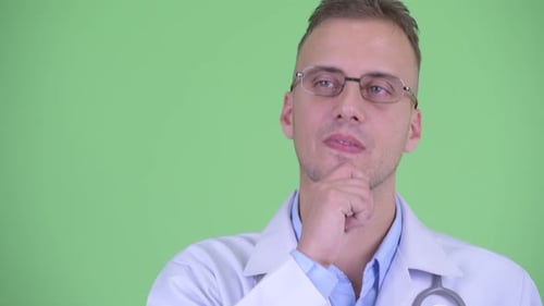 Doctor Thinking with Chin on Hand