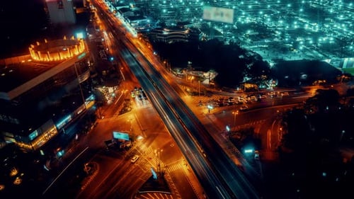 Time Lapse of Busy Highway Road Junction in Metropolis City Center at Night