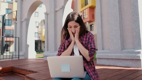 Girl Working with Laptop Outdoors