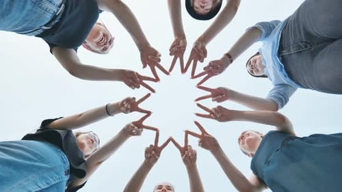 Girlfriends Girls Make Circle Shapes From Their Fingers and Hands and Then Connect Them