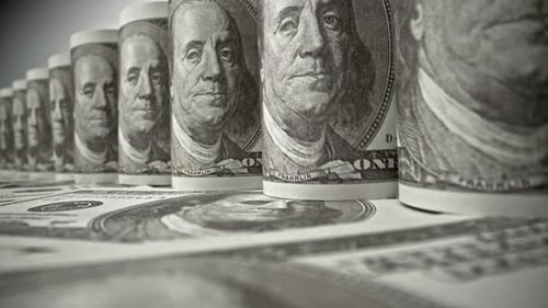 American one hundred dollar paper banknote in close up macro view dolly shot.