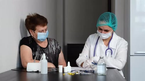 Doctor Consults with Patient about Medications