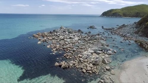 Aerial Shot of Coastline Bay with the Rocks and Cliffs