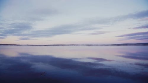 Tranquil lake water in dusk