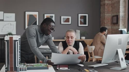 Architect Talking to Manager