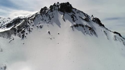 Snowy Mountain Aerial View in Winter Landscape