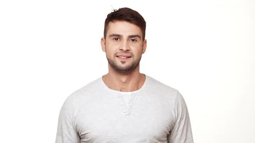 Man Clenches Fists and Yells in Celebration