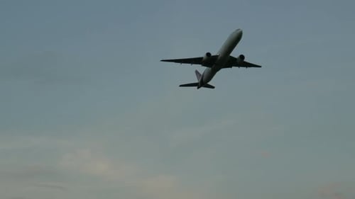 Plane Takes Off Climbing Straight Into Blue Sky