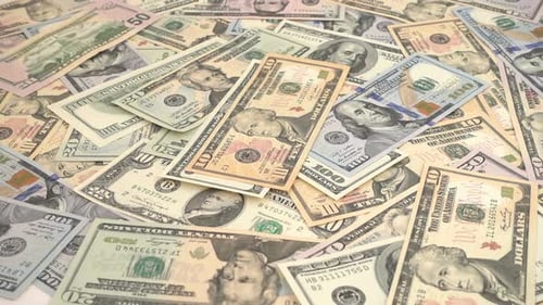 Pile of United States Currency Falling
