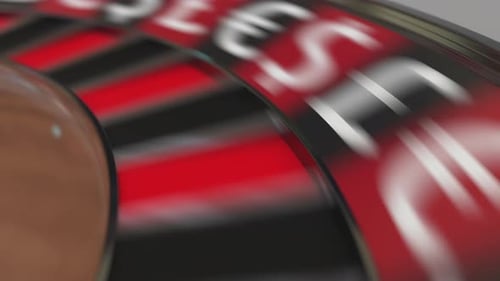 Ball in Turkish Lira Sign Pocket on Casino Roulette Wheel