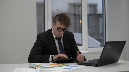 Man Working on Tablet PC