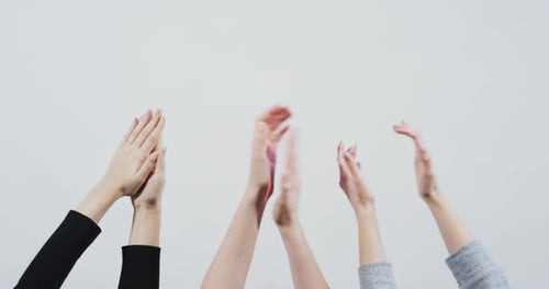 Close up view of hands applauding