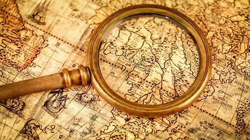 Vintage Map with Magnifying Glass Close Up