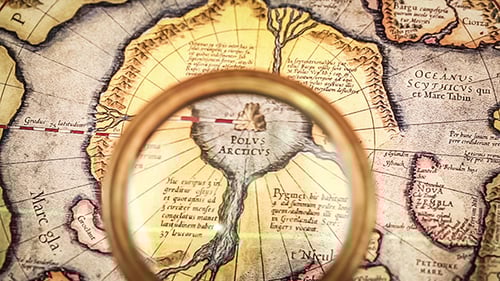 Vintage Map with Magnifying Glass Showing Exploration