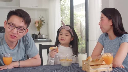 Family Breakfast Together at Home in Bright Kitchen