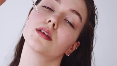 Face Serum Skincare Woman Applying Oil on Skin