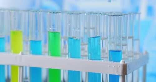 Adding Liquid to Test Tubes in Rack