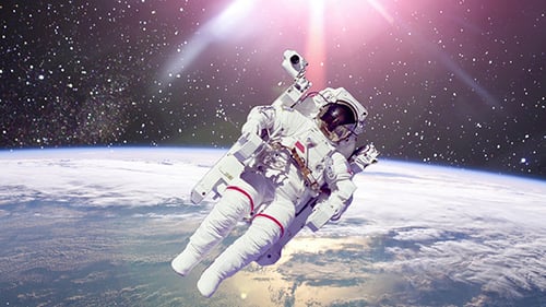 Astronaut Floating Above Earth in Distant Space