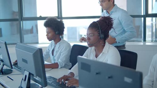 Male Head Call Center Operators Checking How Work Going
