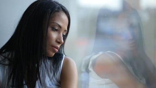 Beautiful Sad Woman Look At Window