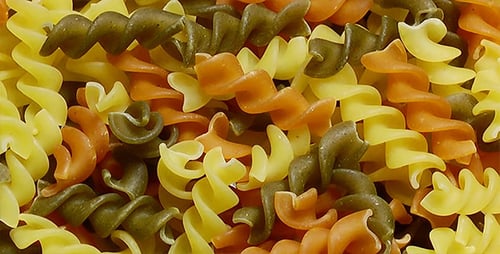 Close Up of Multicolored Dry Rotini Pasta
