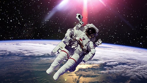 Astronaut Floating in Space Above Earth